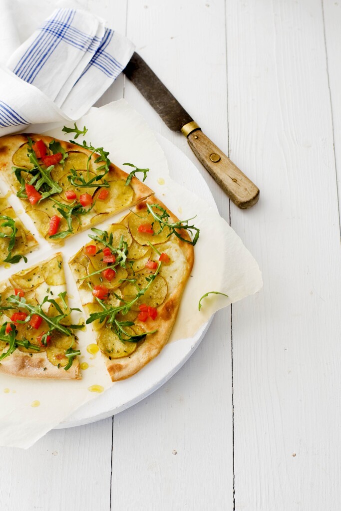 Pizza bianca met rucola