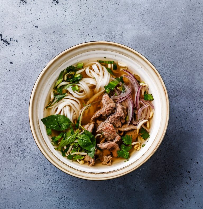 Pho Bo vietnamese Soup with beef in bowl - delicious